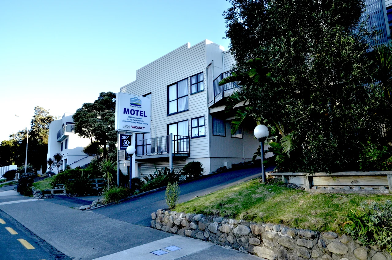 Wrights by the Sea Motel and its sign on Kapiti Road